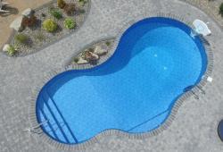 MOUNTAIN LAKE - One of most popular shapes and available in 6 sizes, revel in play and relaxation with this versatile pool shape.
